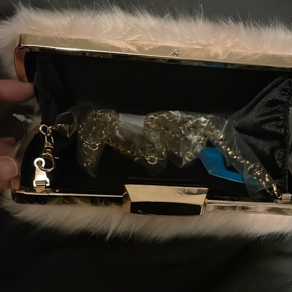 Giovanna faux fur clutch by Eloquii
